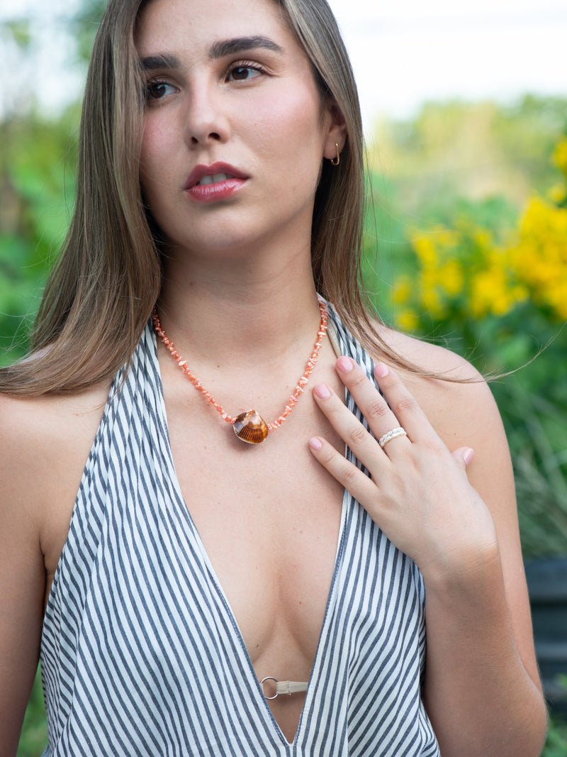 Beachcomber shell necklace on model