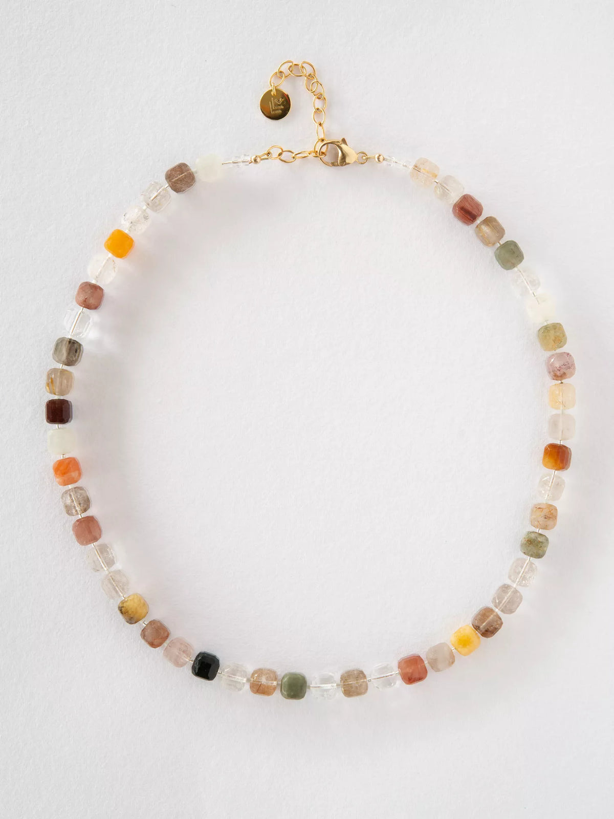 Necklace with multicolored beads on a white background