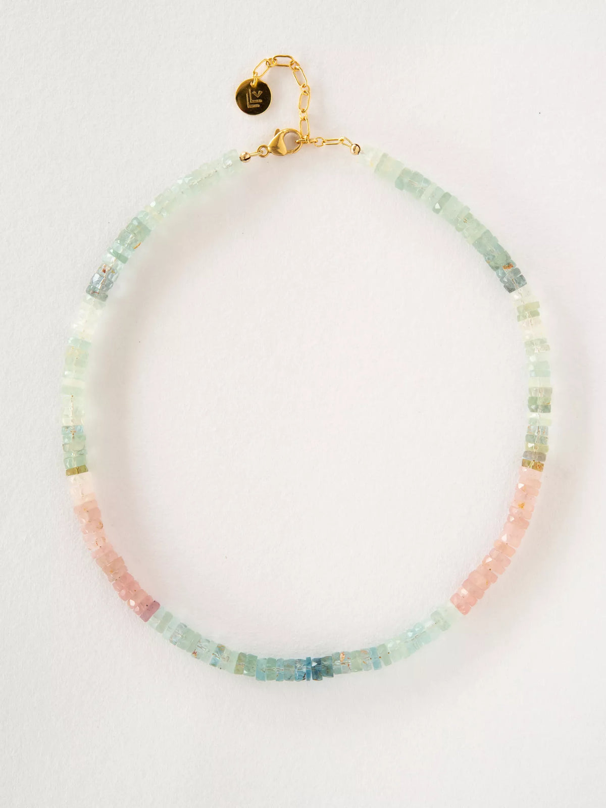 Necklace with multicolored beads on a white background