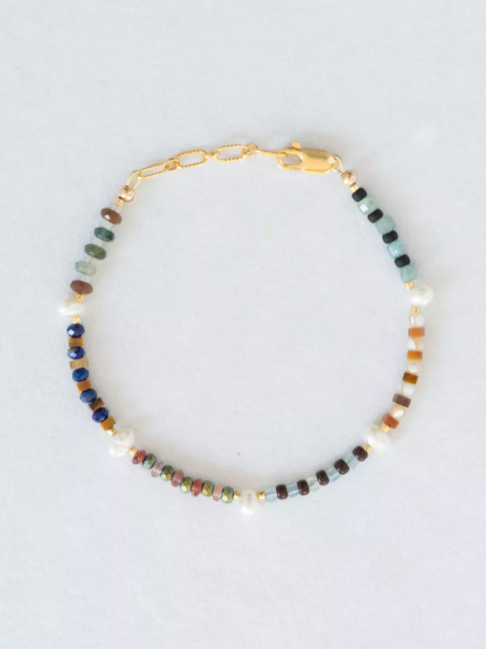Necklace with multicolored beads on a white background