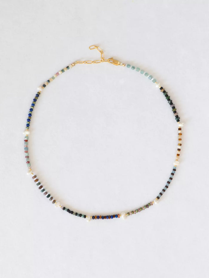 Banded Baby Gems Necklace with Station Pearls flat lay image.
