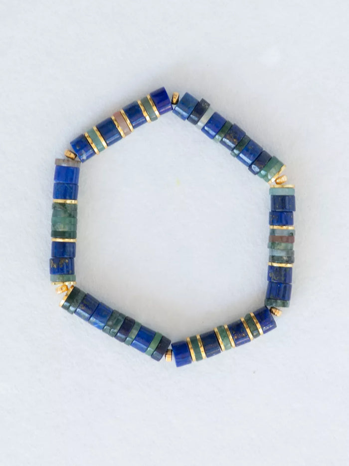 Lapis heishi stretch bracelet flat lay.