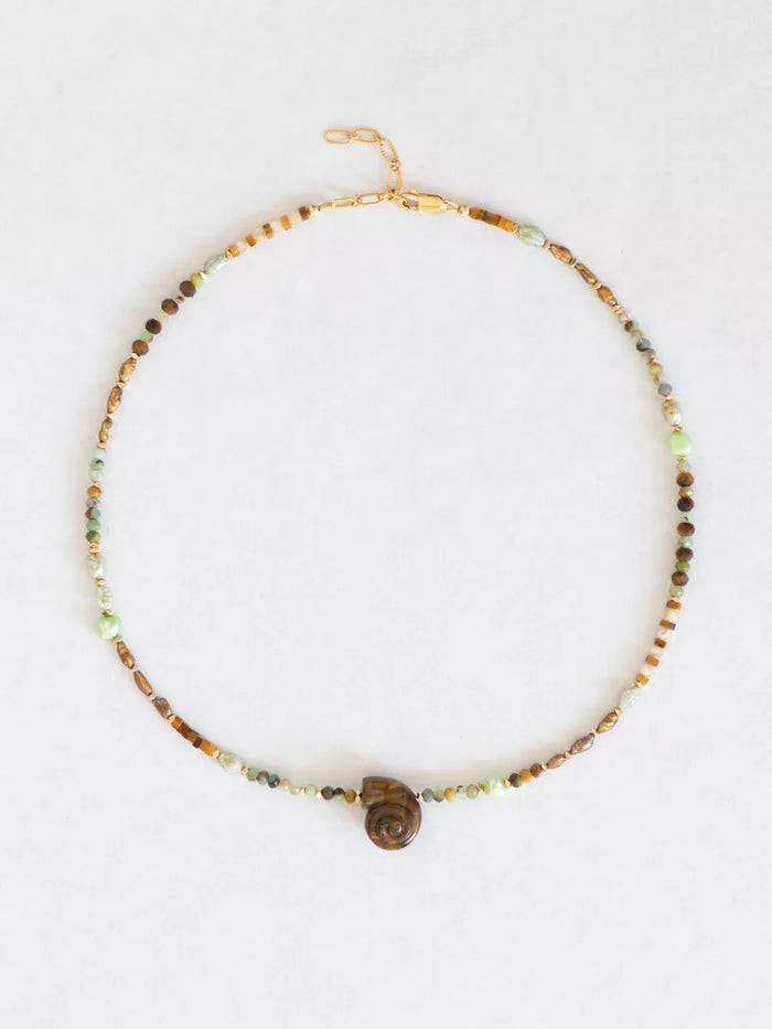 Tiger's Eye Snail Shell beaded necklace flat lay.
