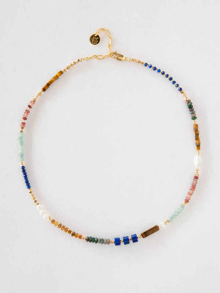 Multicolored beaded necklace on a white background