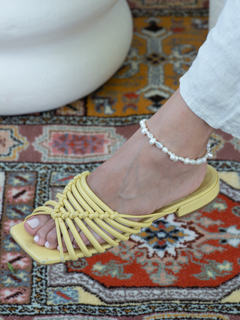 Pearl collective anklet on model