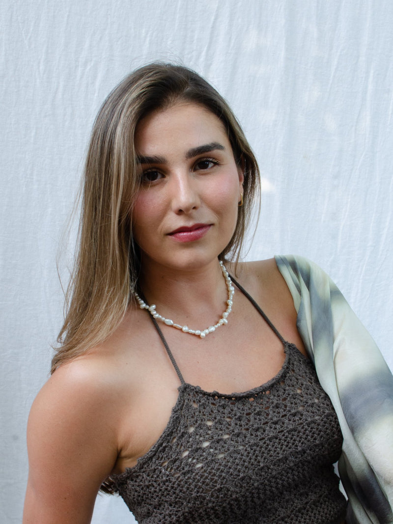 Pearl collective necklace on model