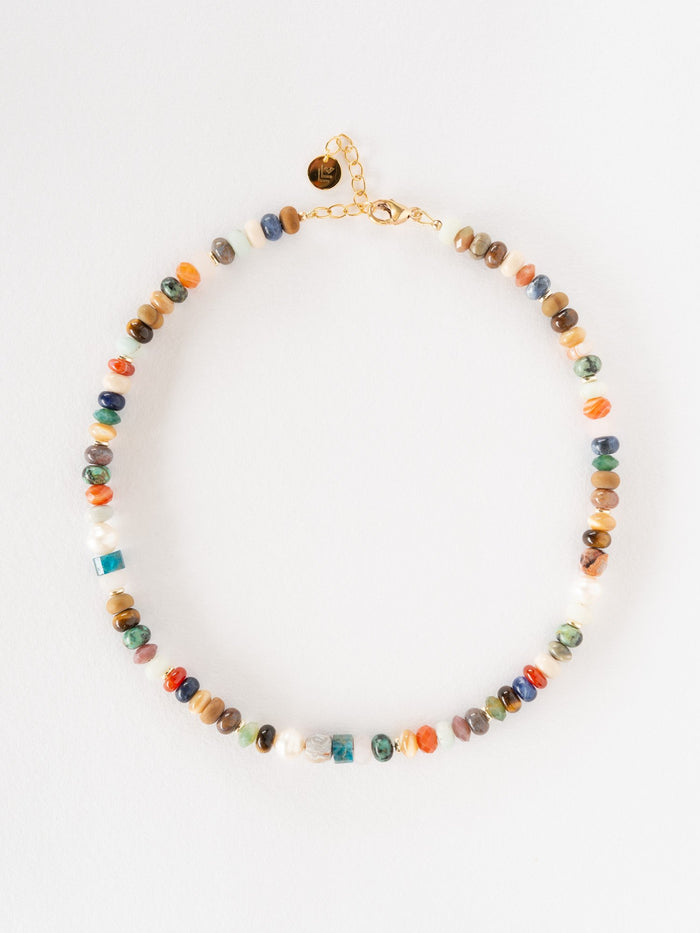 Necklace with multicolored beads on a white background
