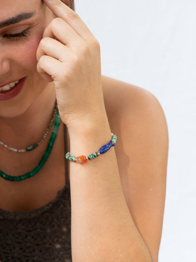 Model wearing turquoise bracelet