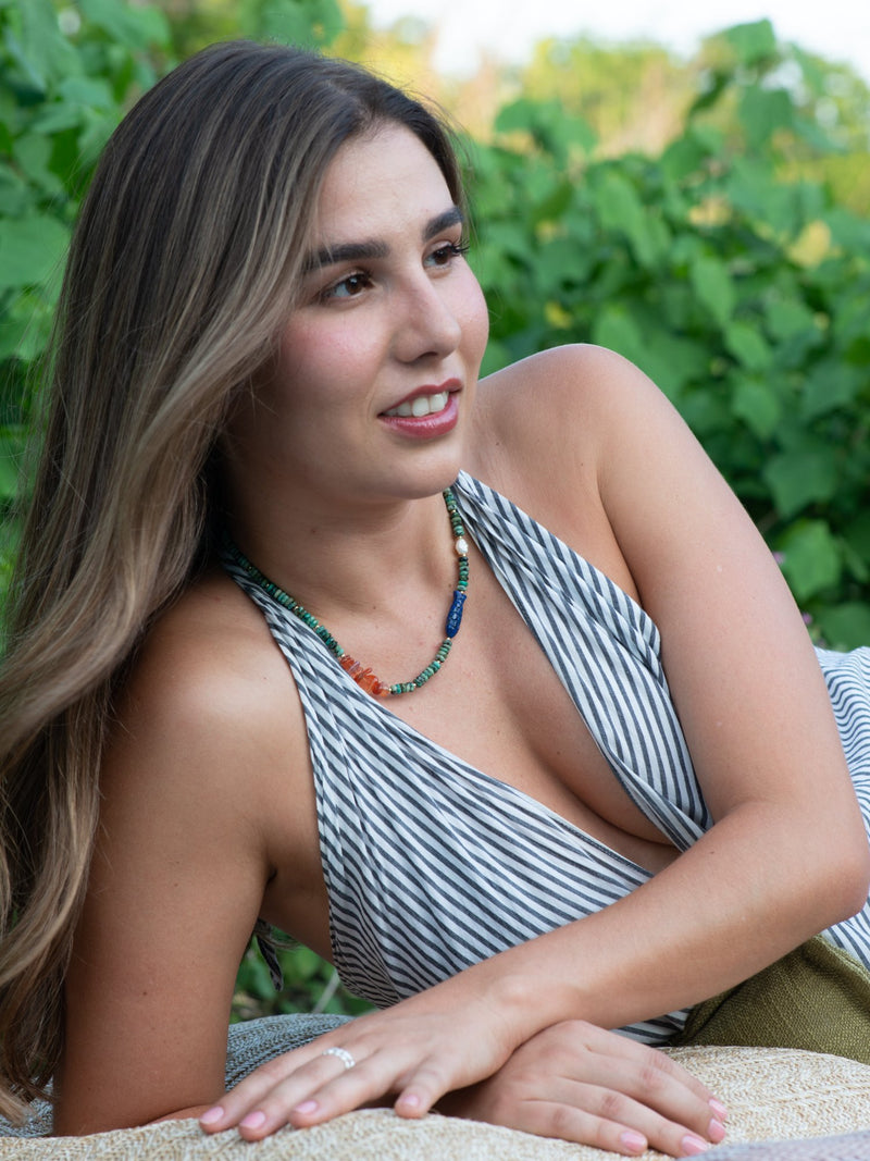 Model wearing thalassophile turquoise necklace